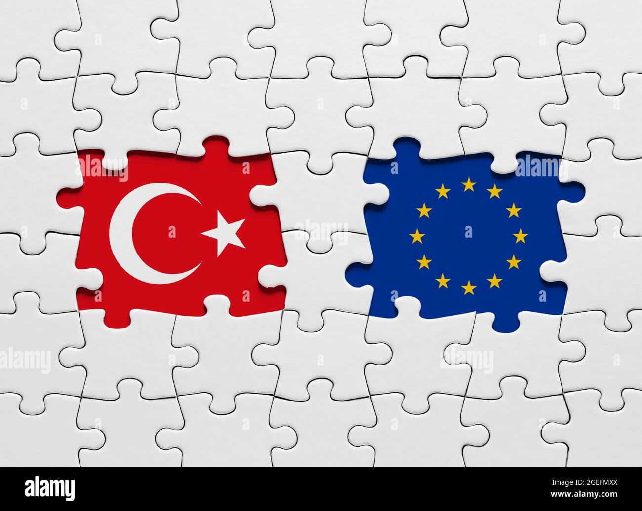 Jigsaw puzzle with the national flags of Turkey and European Union.  International conflict or partnership concept Stock Photo - Alamy