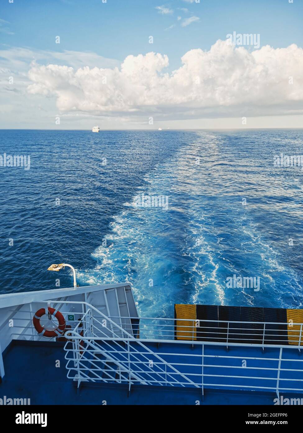 View of back ship cruise sea ocean and other ferry in background - concept of transport and summer holiday vacation season Stock Photo
