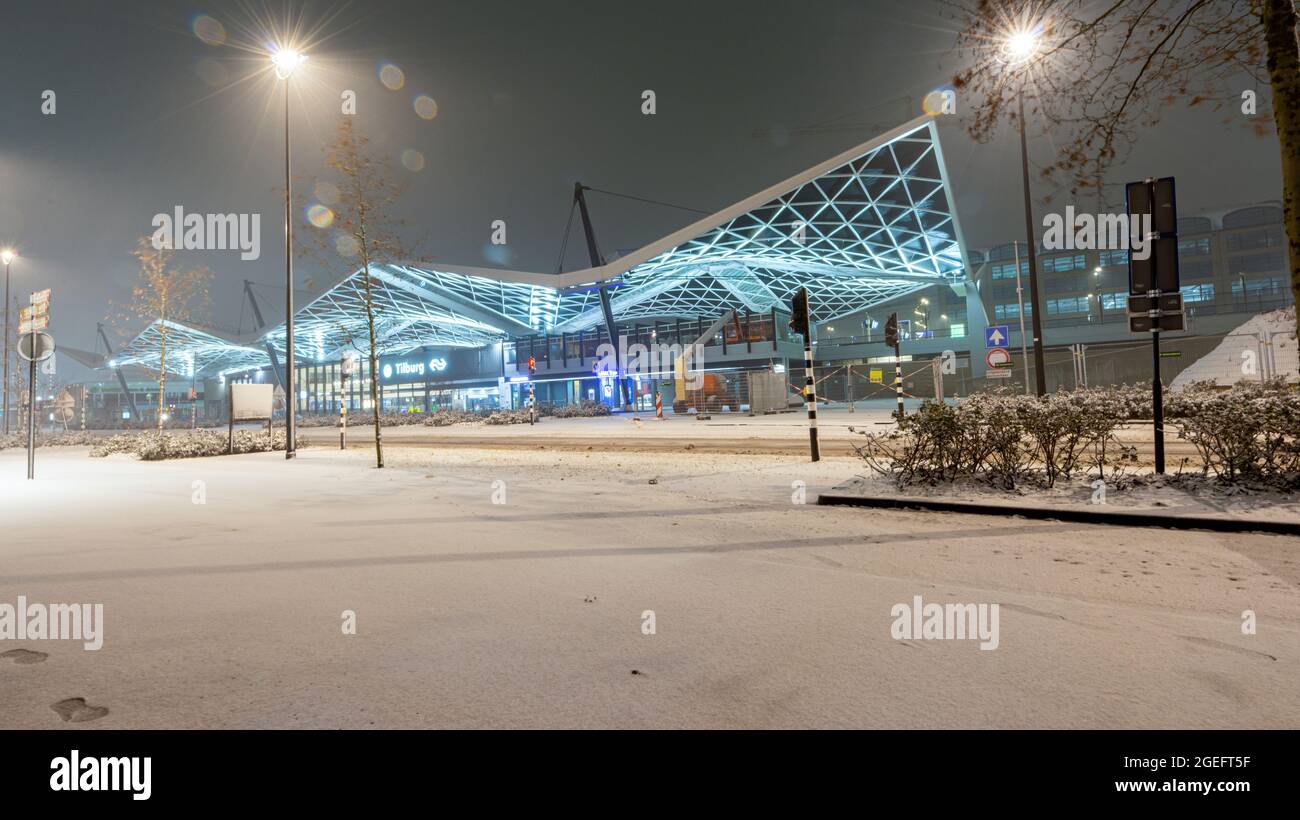 Tilburg, Netherlands. Down Town during First Annual Snow of the Year, combined with Corona / Covid-19 Pandemic and Curfew creates a very, very quiet s Stock Photo