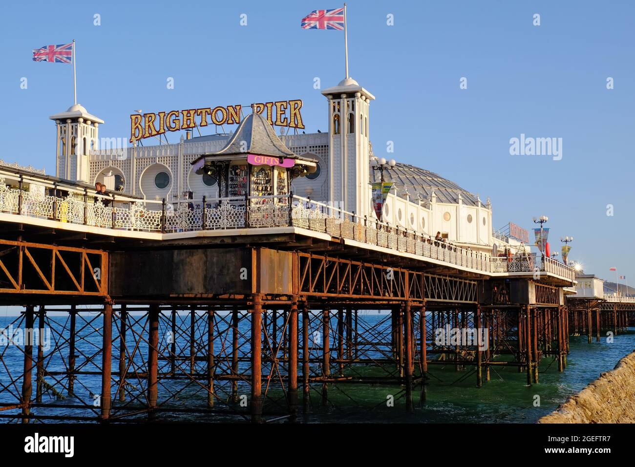 Brighton Palace Pier soon before sunset at Brighton, East Sussex, England Stock Photo