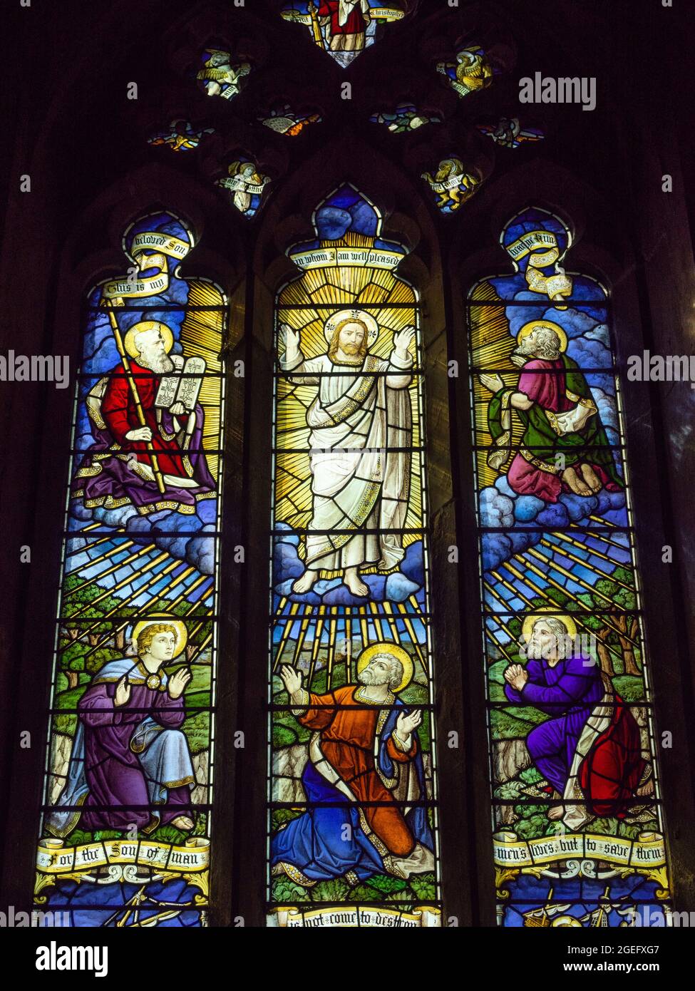 Stained glass window in the 14th century decorated church of St Mary