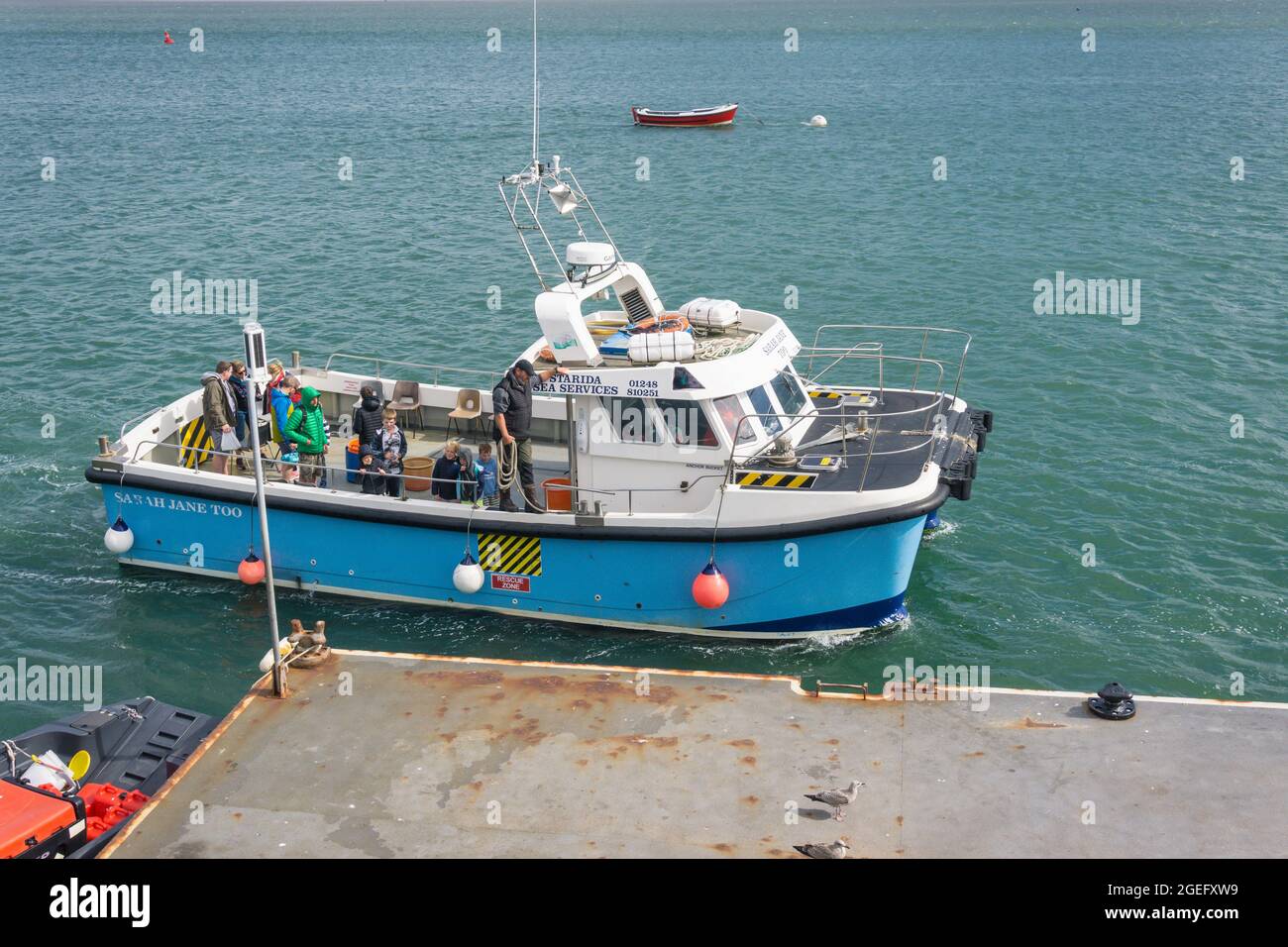 Starida Sea Services boat with tourists on a pleasure cruise from Beaumaris to Puffin Island in Anglesey Stock Photo