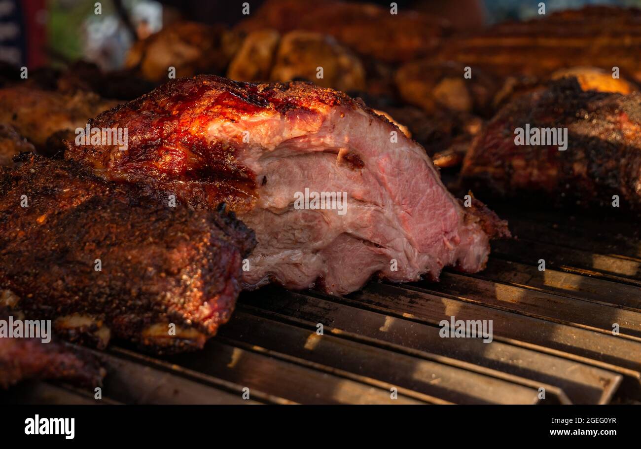 large cut of beef roasted on the barbecue grill Stock Photo Alamy