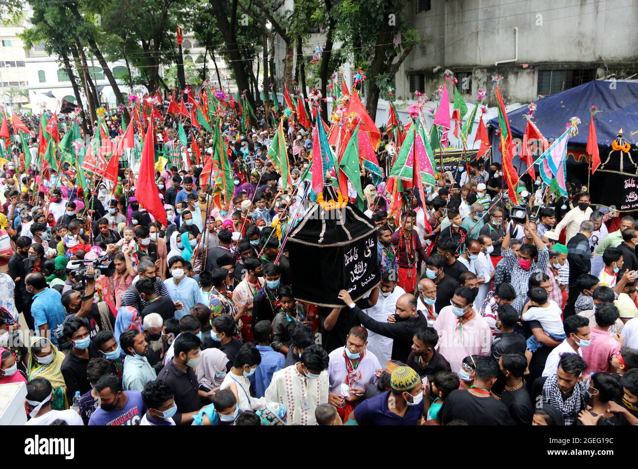 Dhaka, Bangladesh. 20th Aug, 2021. The tenth day of Muharram is celebrated as Ashura, Shia muslims celebrate the day as mourning day for recalling the martyrdom of Prophet Hazrat Muhammad's grandson Hazrat Imam Hussain, his relatives and 72 supporters during the clash of Karbala on this day in the Hijri year of 61. To recognize the day, consistently, Shias bring out customary parade known as Tazia in various regions of Bangladesh, including capital Dhaka. Credit: Abaca Press/Alamy Live News Stock Photo