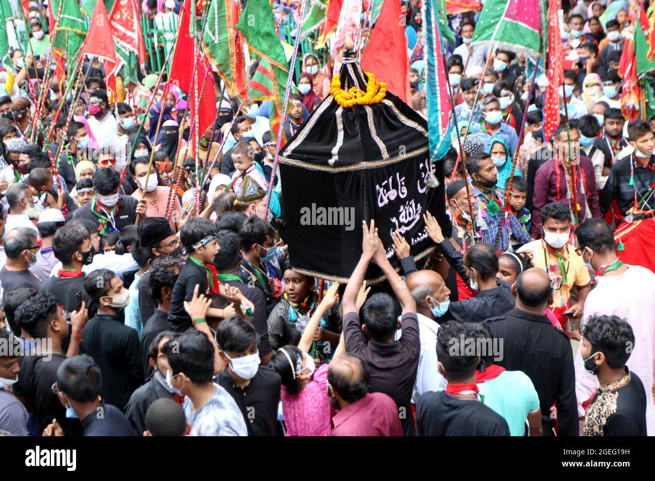 Dhaka, Bangladesh. 20th Aug, 2021. The tenth day of Muharram is celebrated as Ashura, Shia muslims celebrate the day as mourning day for recalling the martyrdom of Prophet Hazrat Muhammad's grandson Hazrat Imam Hussain, his relatives and 72 supporters during the clash of Karbala on this day in the Hijri year of 61. To recognize the day, consistently, Shias bring out customary parade known as Tazia in various regions of Bangladesh, including capital Dhaka. Credit: Abaca Press/Alamy Live News Stock Photo