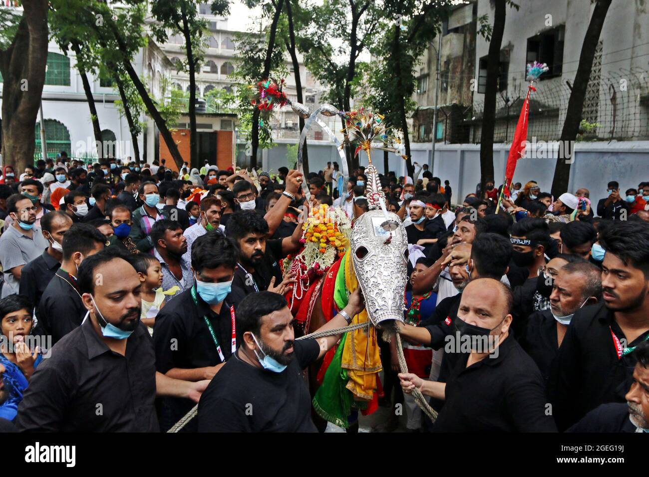Dhaka, Bangladesh. 20th Aug, 2021. The tenth day of Muharram is celebrated as Ashura, Shia muslims celebrate the day as mourning day for recalling the martyrdom of Prophet Hazrat Muhammad's grandson Hazrat Imam Hussain, his relatives and 72 supporters during the clash of Karbala on this day in the Hijri year of 61, To recognize the day, consistently, Shias bring out customary parade known as Tazia in various regions of Bangladesh, including capital Dhaka. Credit: Abaca Press/Alamy Live News Stock Photo