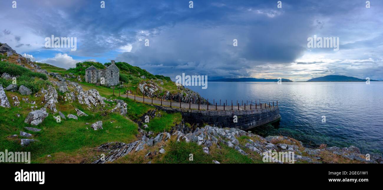 Craignish, Scotland - August 6, 2021:  Stormy skies over Sound of Jura, Corryvreckan and island from Craignish Point, Scotland Stock Photo
