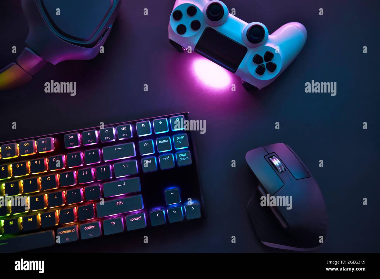 Top down view of various gaming accessories laying on table. Colorful  illuminated devices. Professional computer game playing, esport business  and onl Stock Photo - Alamy