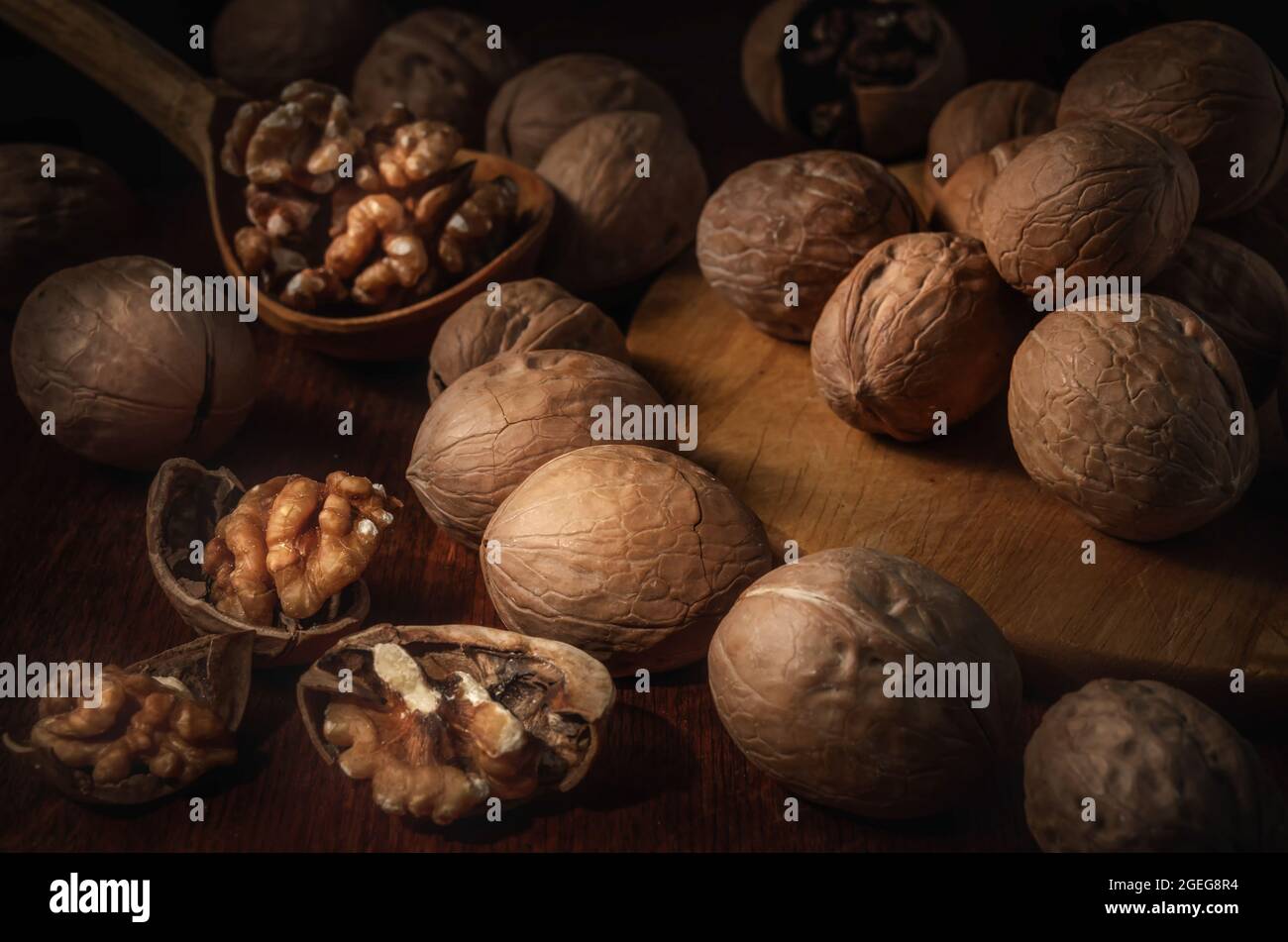 walnuts on a dark background in a rustic style Stock Photo