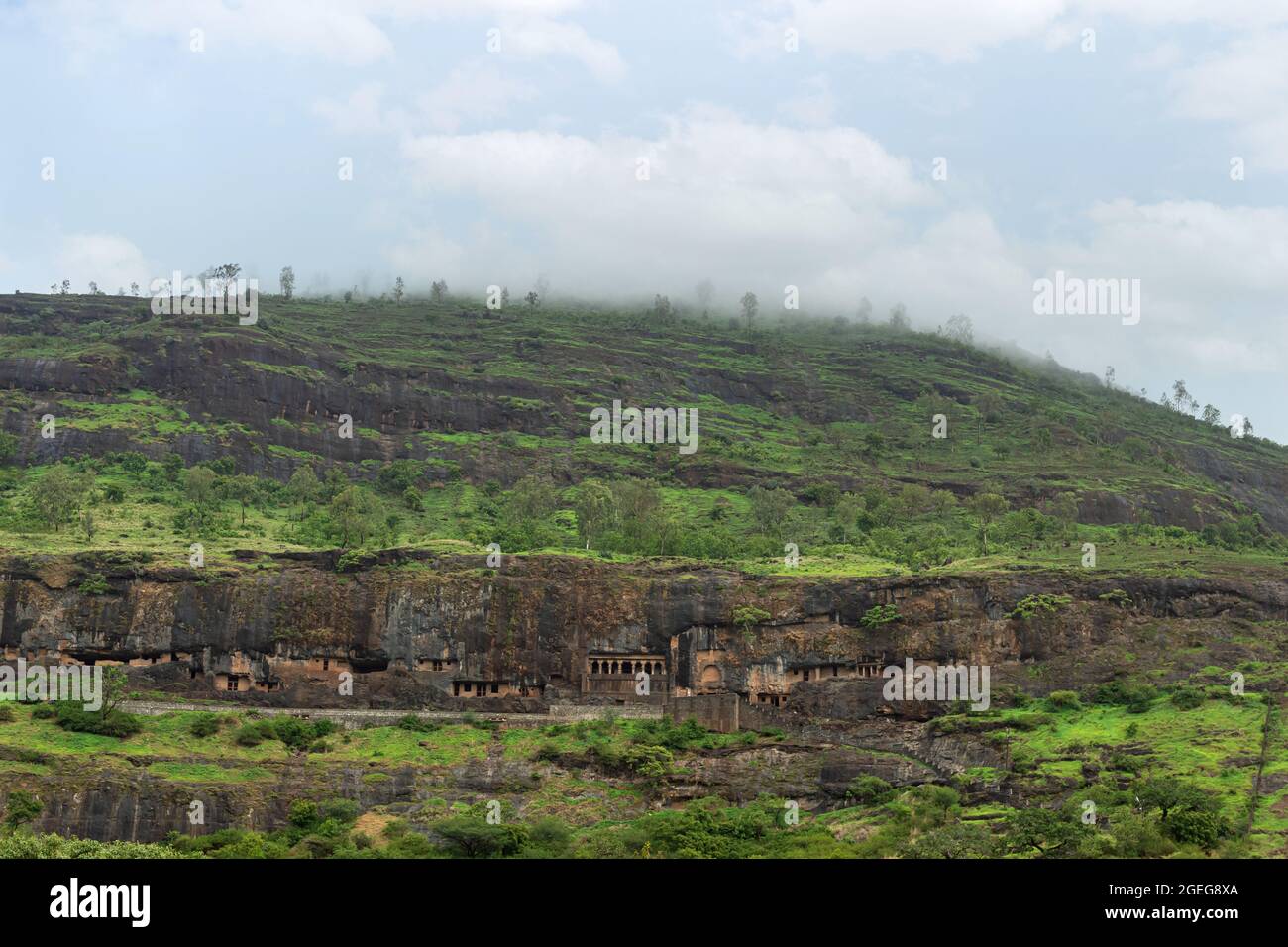 Vew of Lenyadri cave facade during rainy season, Pune, Maharashtra, India. Stock Photo