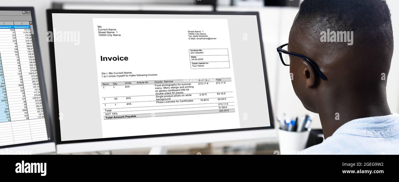 Tax Account Invoice Spreadsheet Report On Computer Monitor Stock Photo