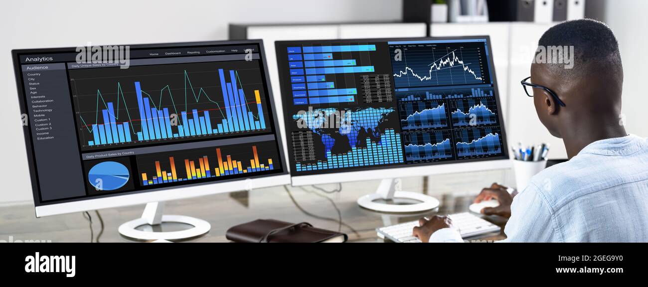 African Advisor Using KPI Dashboard With Financial Analytics Graphs Stock Photo