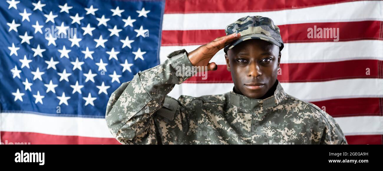 soldiers saluting the flag