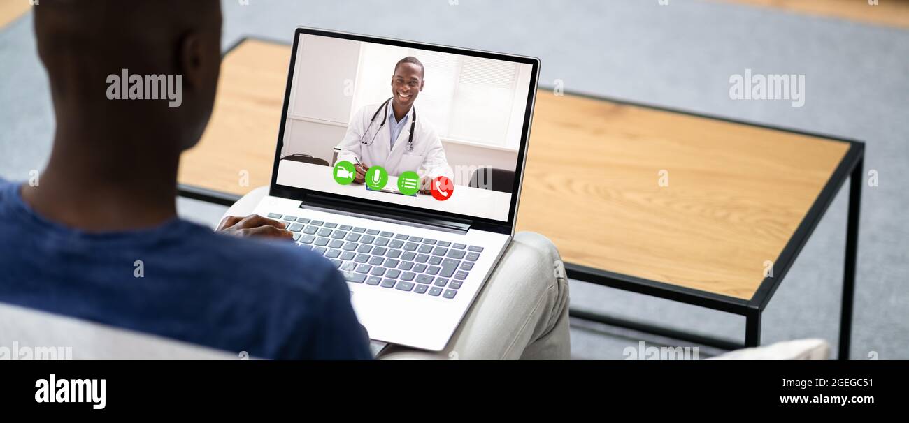 Online Video Conference With Medical Doctor On Laptop Stock Photo