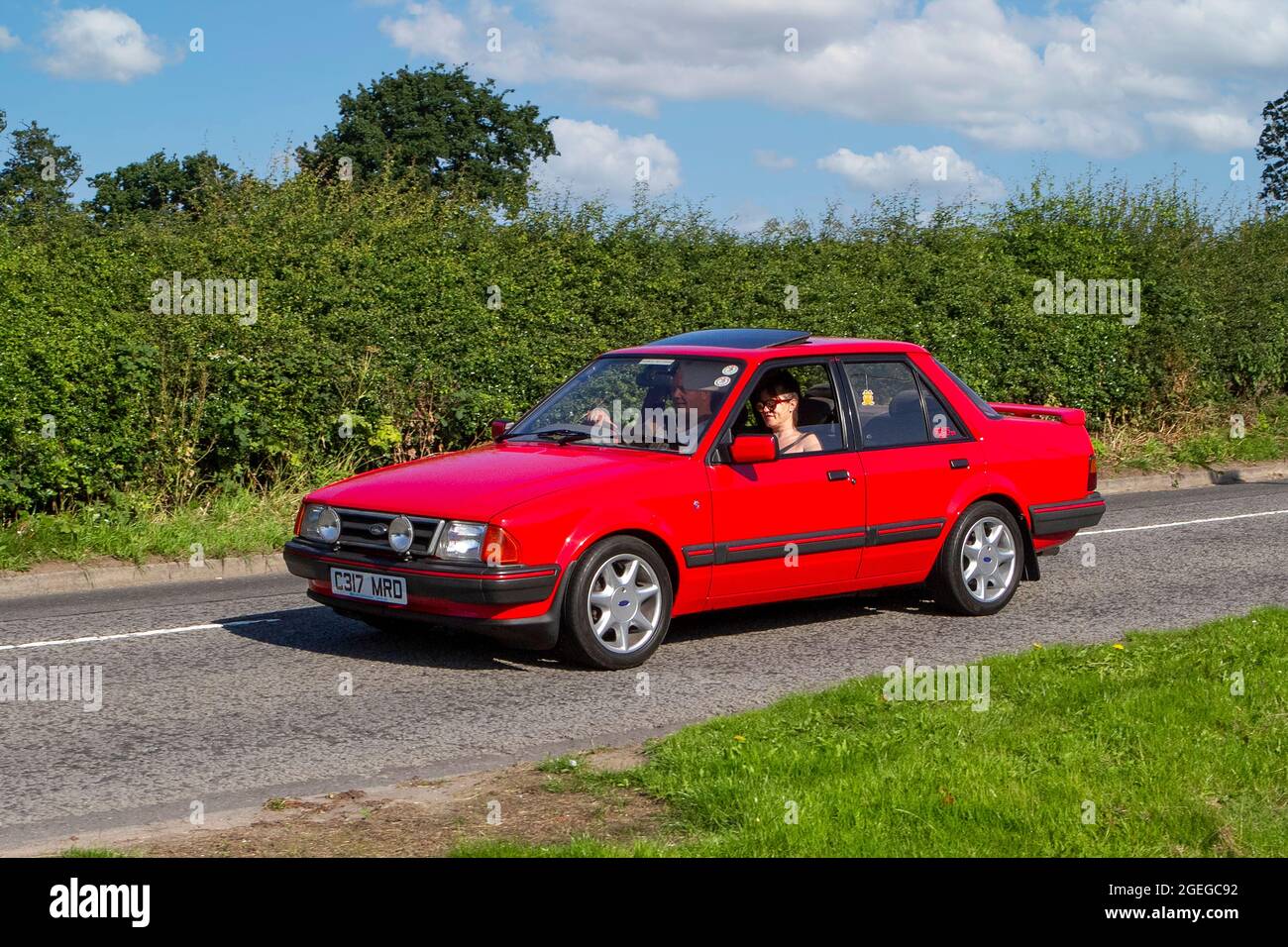 A front view of a RED 1980s 80s FORD ORION vintage classic car retro driver vehicle automobile Stock Photo