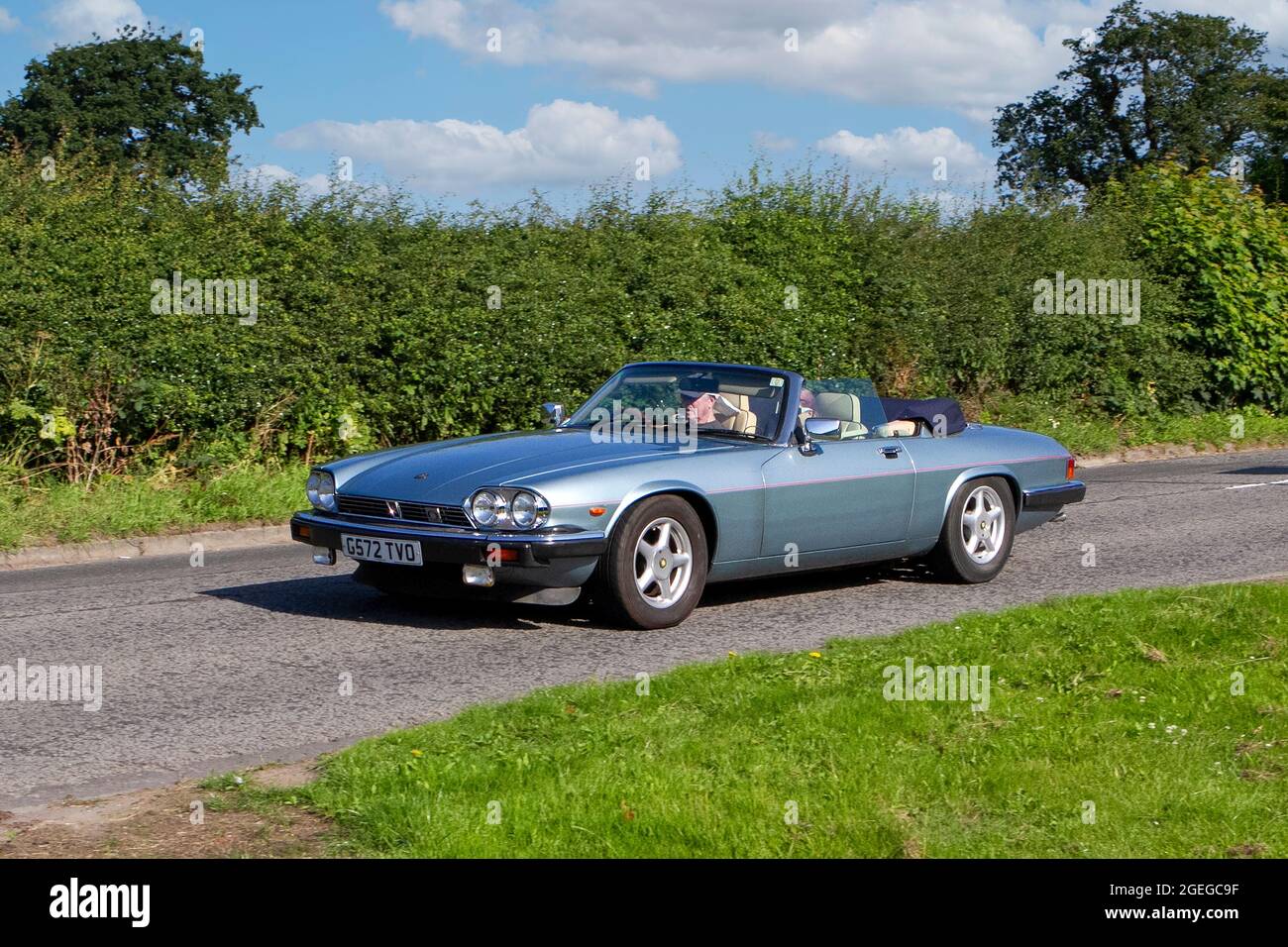 A front view of a Blue Jaguar Xj-S Convertible Auto Cabriolet vintage classic car retro driver vehicle automobile Stock Photo