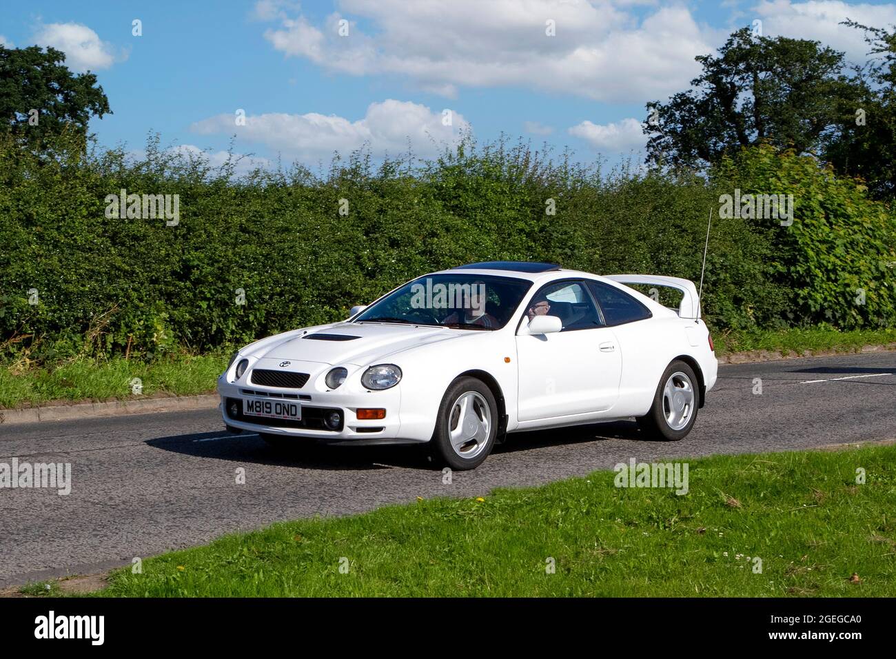 A front view of 1990s 90s Toyota Celica Gt-4 White Coupe vintage classic car retro driver vehicle automobile Stock Photo