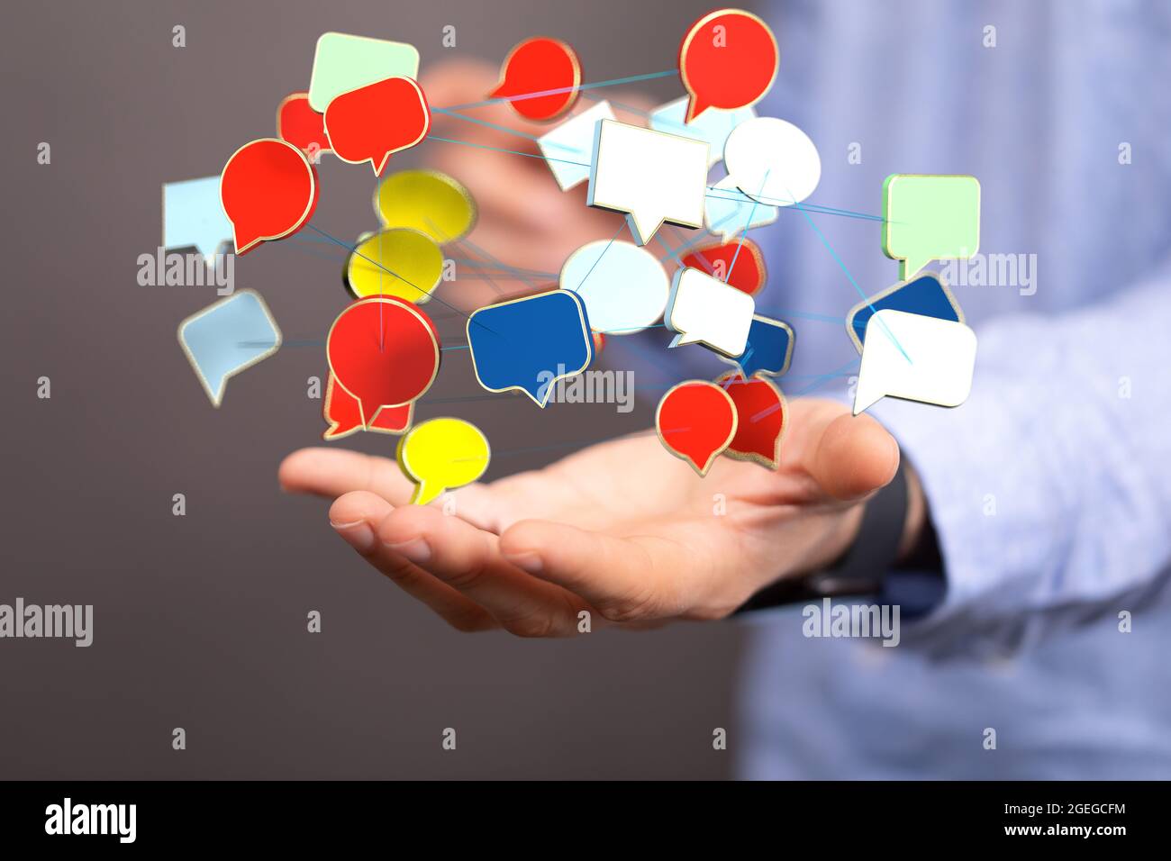 Talk bubble speech icon. Hand holding blank Stock Photo