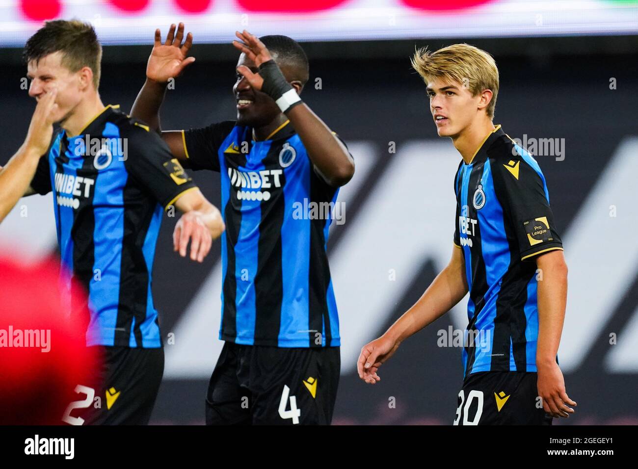 Waregem Belgium August 15 Charles De Ketelaere Of Club Brugge Celebrates After Scoring His Sides Third Goal With Hans Vanaken Of Club Brugge Eduard Sobol Of Club Brugge Noa Lang Of
