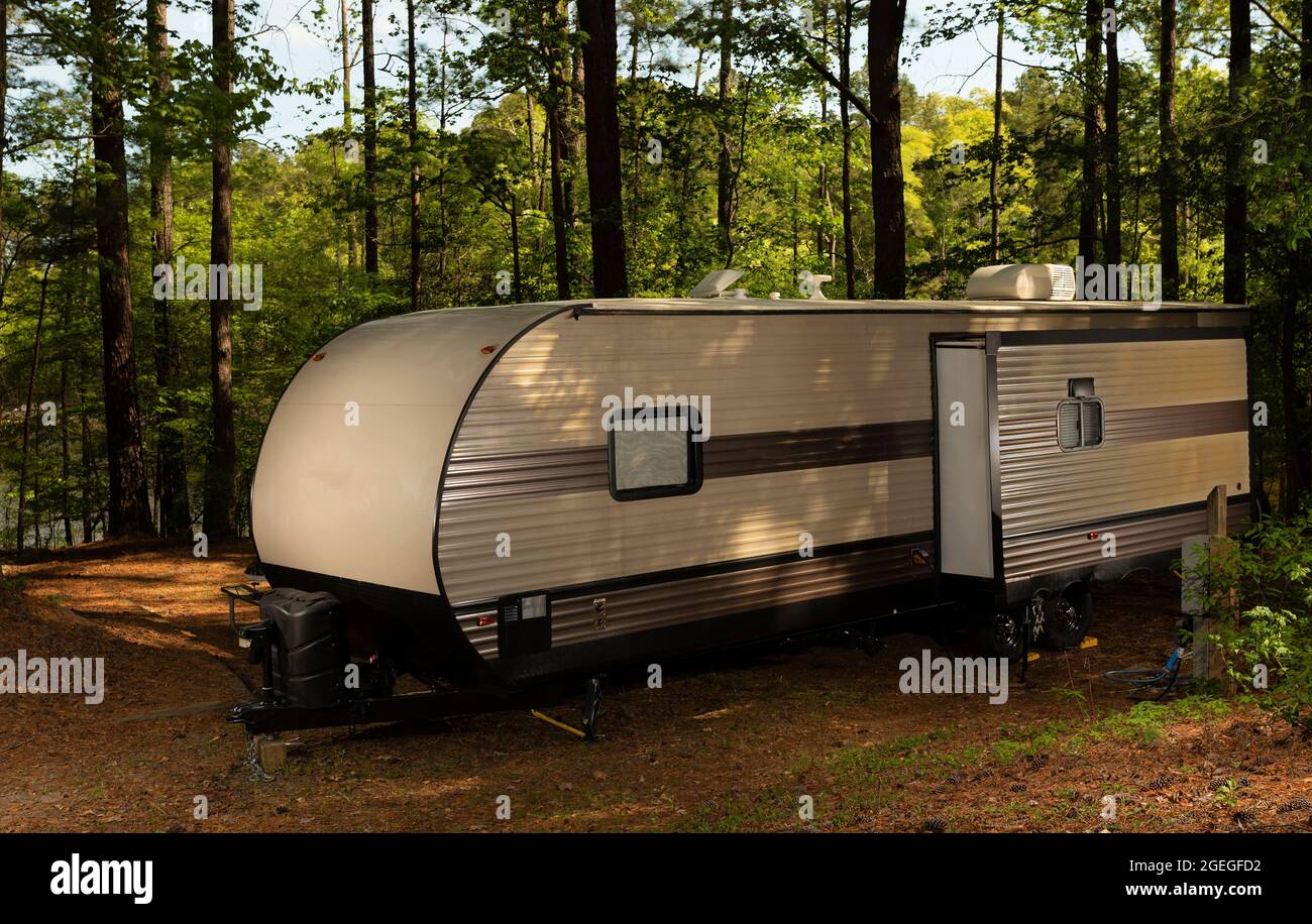 Electric and water side of a camping trailer set up at Jordan Lake NC