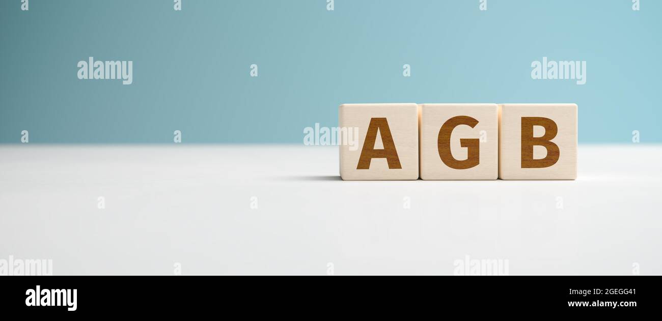 'AGB' web banner - the German abbreviation for 'Allgemeine Geschäftsbedingungen' (Terms and Conditions) built from letters on wooden cubes for the use Stock Photo