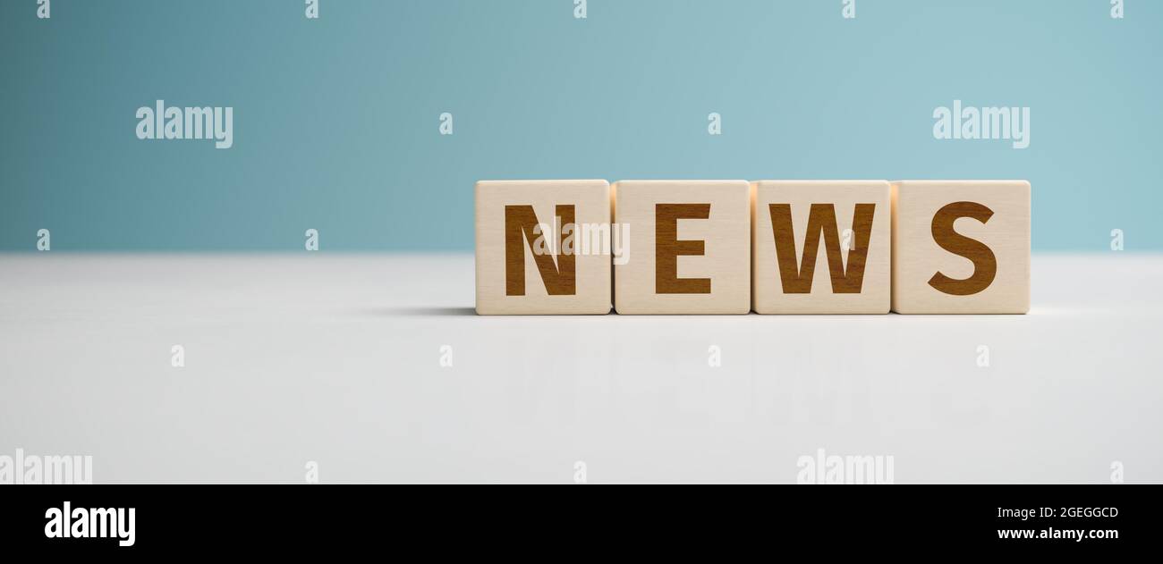 "News" web banner - the word "News" built from letters on wooden cubes for the use as a web banner. Stock Photo