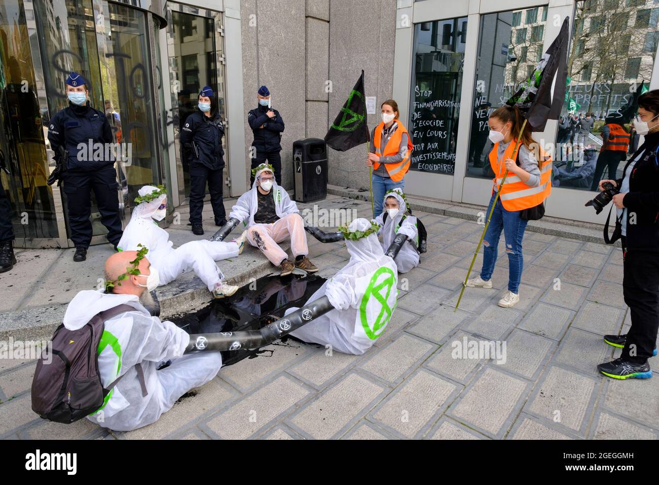 Belgium, Brussel, April 1, 2021: demonstration of the global environmental movement Extinction Rebellion in front of the headquarters of EuroClear, to Stock Photo