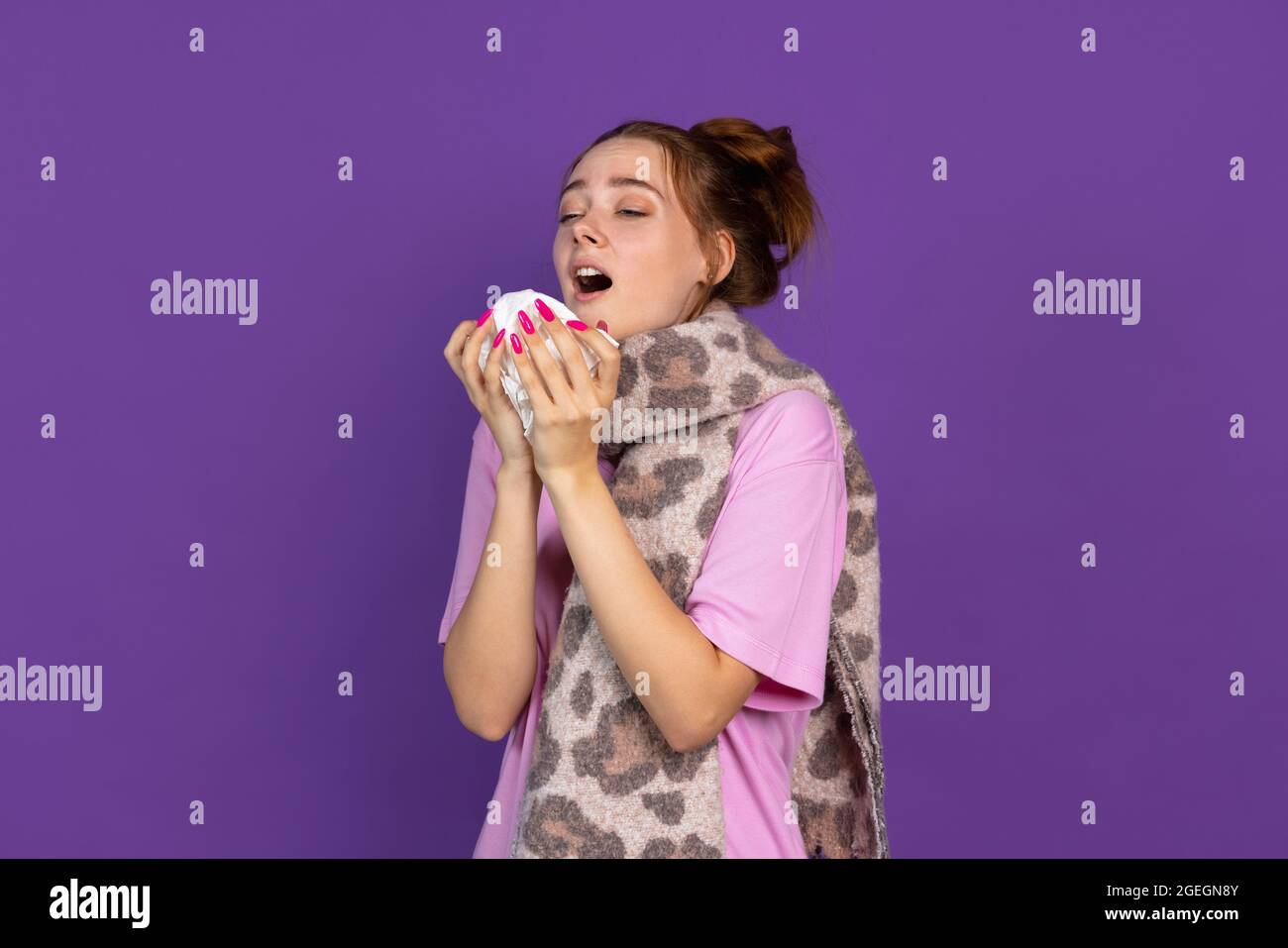 Halflength portrait of young sick girl isolated on purple, lilac color