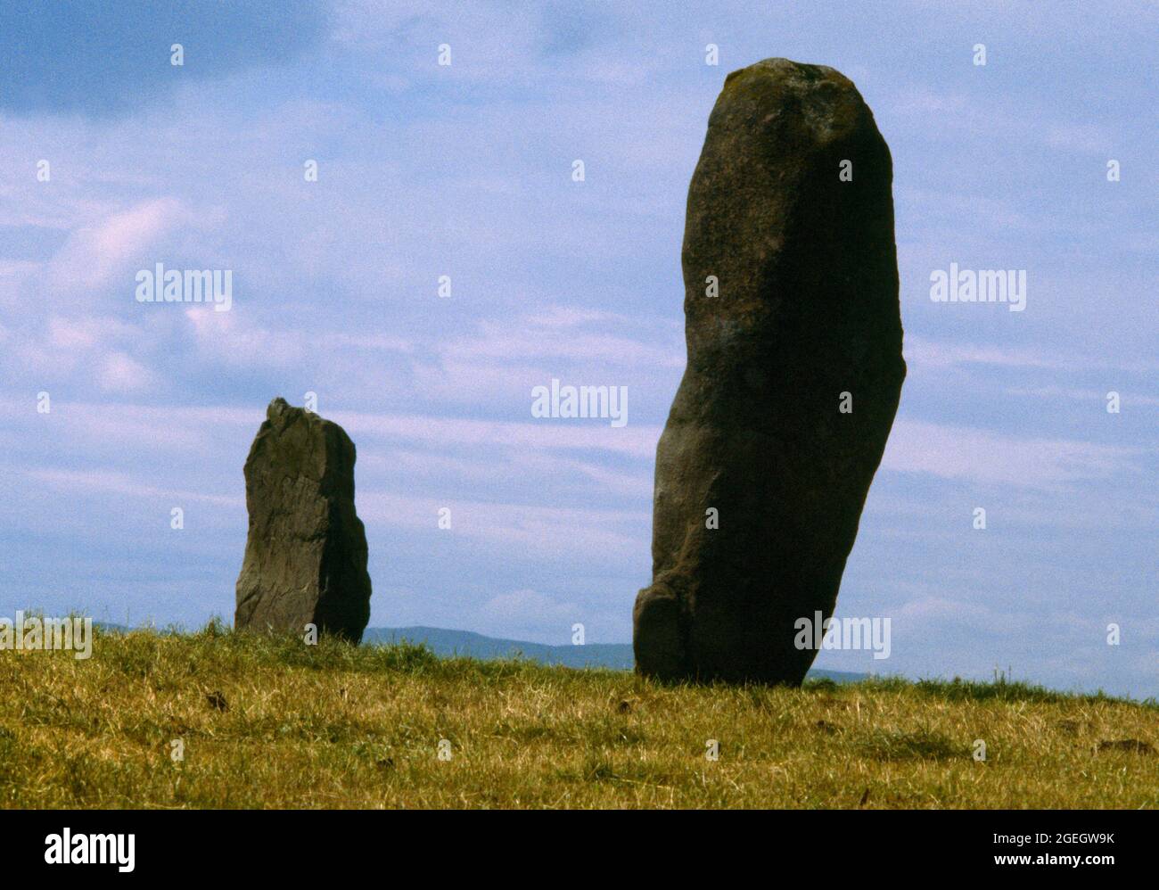 View NW of Orwell standing stones, Kinross, Scotland, UK: two whinstone boulders which formed the focus of cremation burials in the Bronze Age. Stock Photo