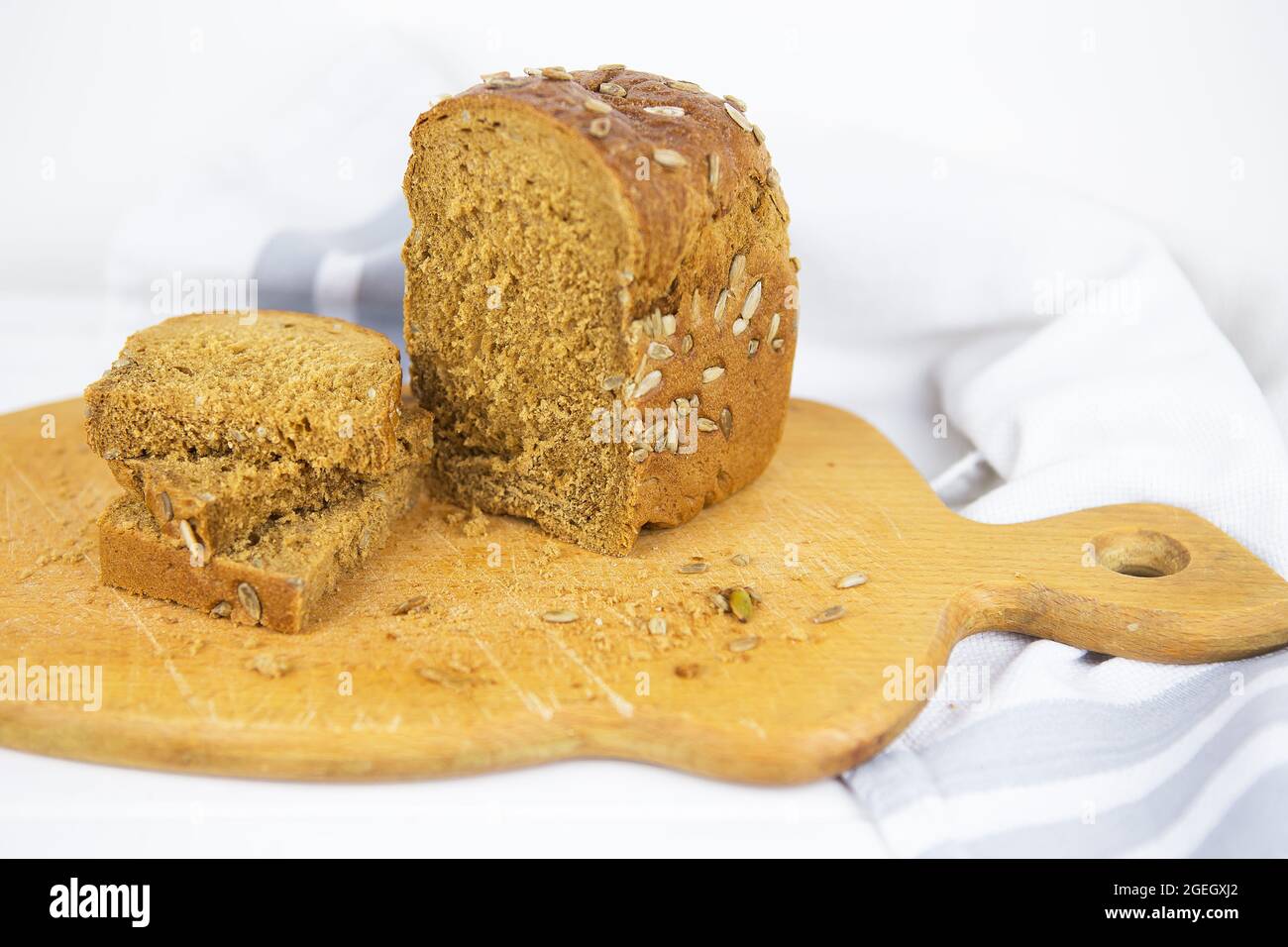 Top view of sliced wholegrain bread on a wooden table Stock Photo - Alamy