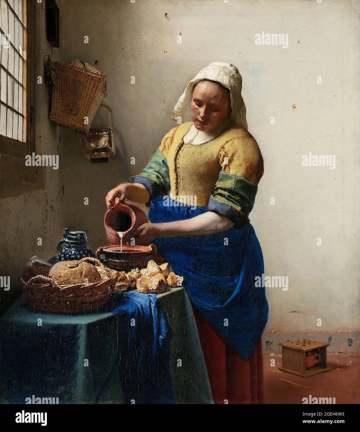 Johannes van der Meer, Jan Vermeer, Jan Vermeer van Delft, 1632-1675, The Milkmaid, 1660, oil on canvas,  Rijksmuseum Amsterdam, Stock Photo