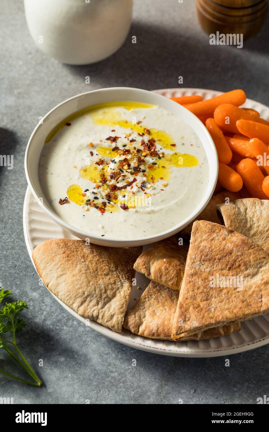 Homemade Organic Greek Yogurt Labneh Dip with Olive Oil Stock Photo - Alamy