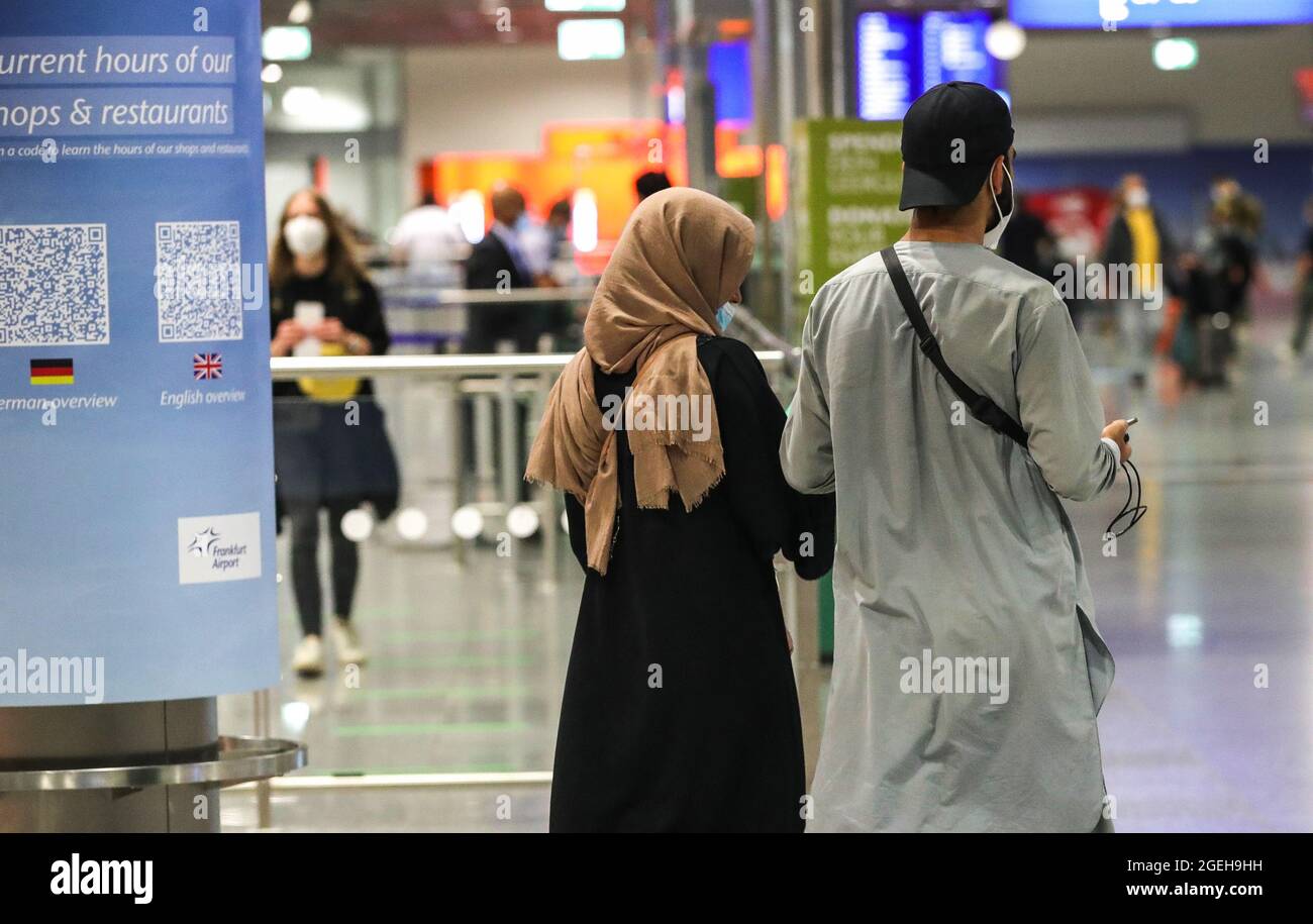 Frankfurt, Germany. 20th Aug, 2021. Passengers of a flight of Lufthansa bringing evacuees from Afghanistan arrive at Frankfurt International Airport, in Frankfurt, Germany, Aug. 20, 2021. Credit: Armando Babani/Xinhua/Alamy Live News Stock Photo