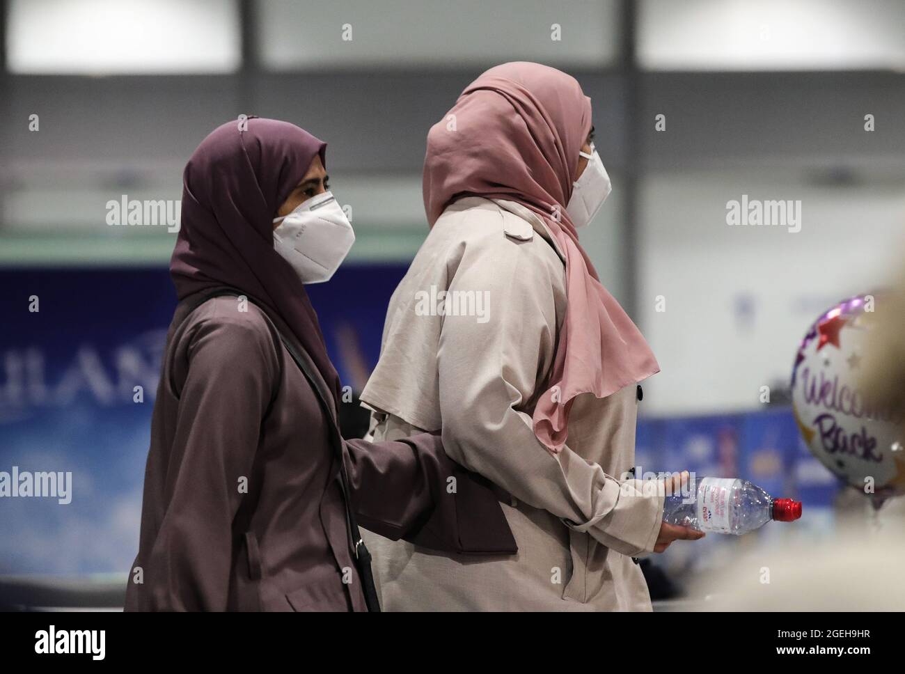 Frankfurt, Germany. 20th Aug, 2021. Passengers of a flight of Lufthansa bringing evacuees from Afghanistan arrive at Frankfurt International Airport, in Frankfurt, Germany, Aug. 20, 2021. Credit: Armando Babani/Xinhua/Alamy Live News Stock Photo