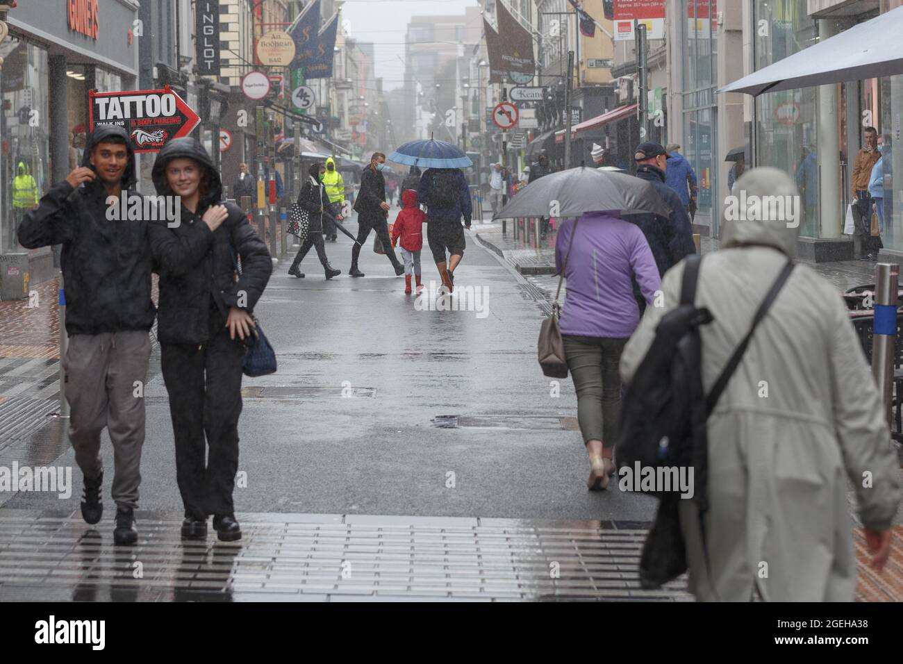 Cork Raining Cork, Ireland. 20th Aug, 2021. Shoppers Brave Heavy Rain, Cork, Ireland ...