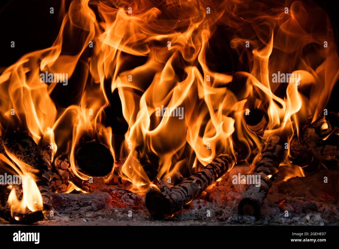 Fire and flame produced by burning wood inside an oven Stock Photo Alamy