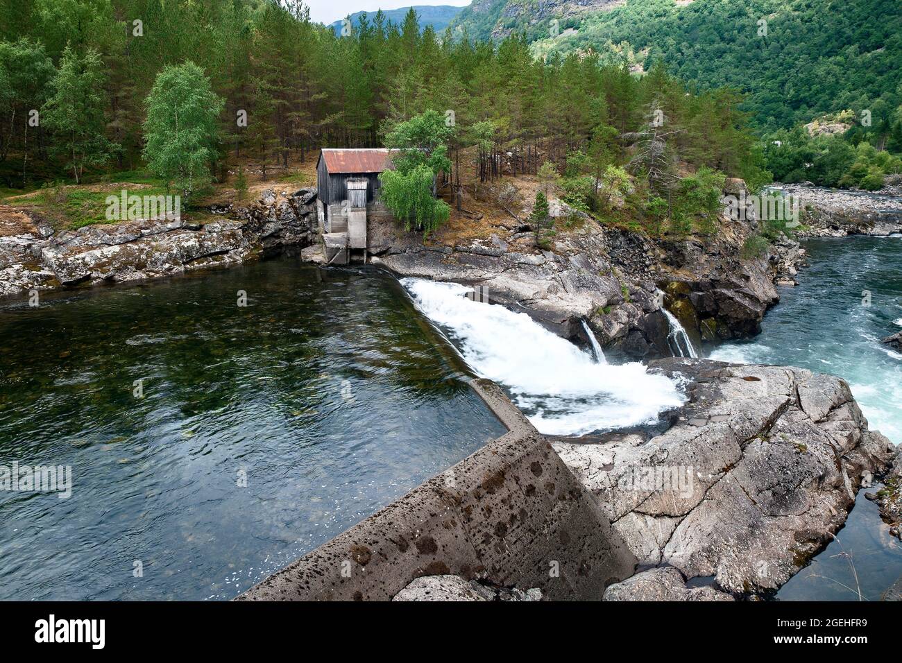 Old pumping station at a river near Sognefjord, Norway Stock Photo