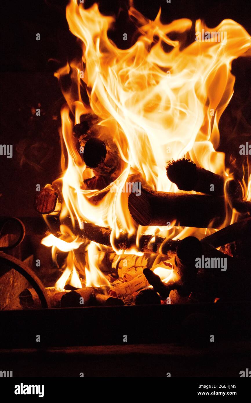 Wood combustion for heat production for domestic heating Stock Photo