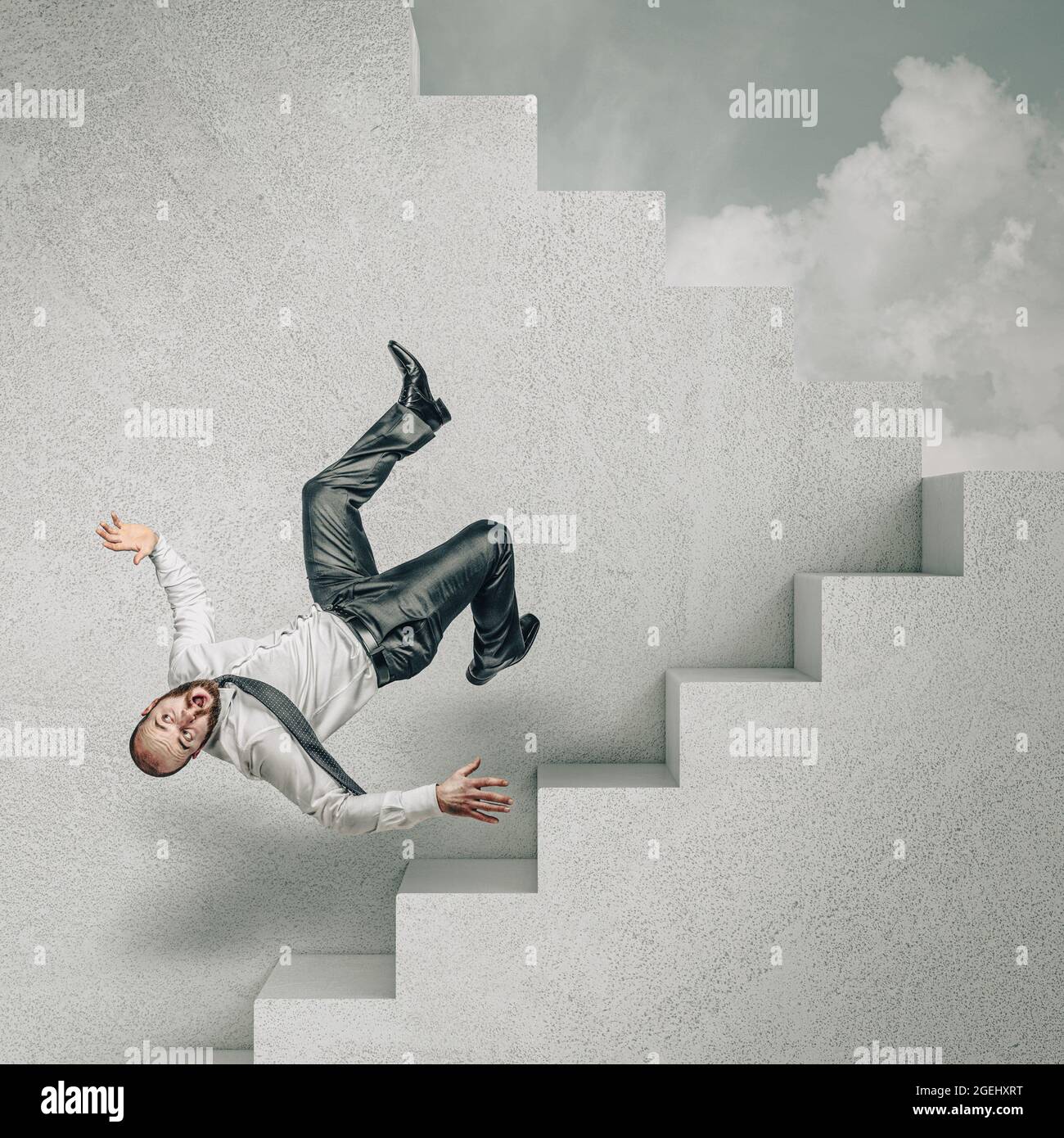 man falling down the stairs Stock Photo