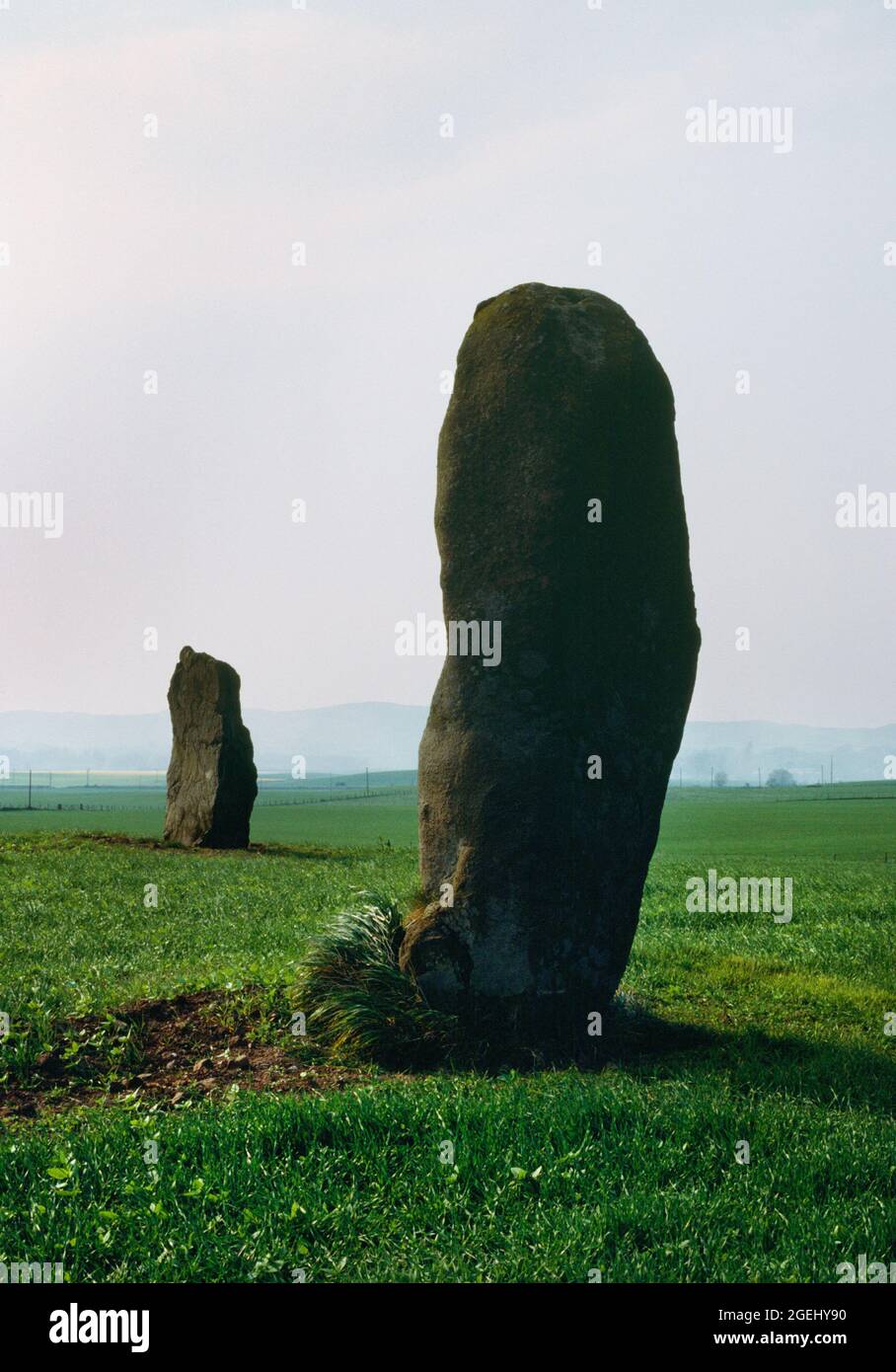 View SW of Orwell standing stones, Kinross, Scotland, UK, two whinstone boulders which formed the focus of cremation burials in the Bronze Age. Stock Photo