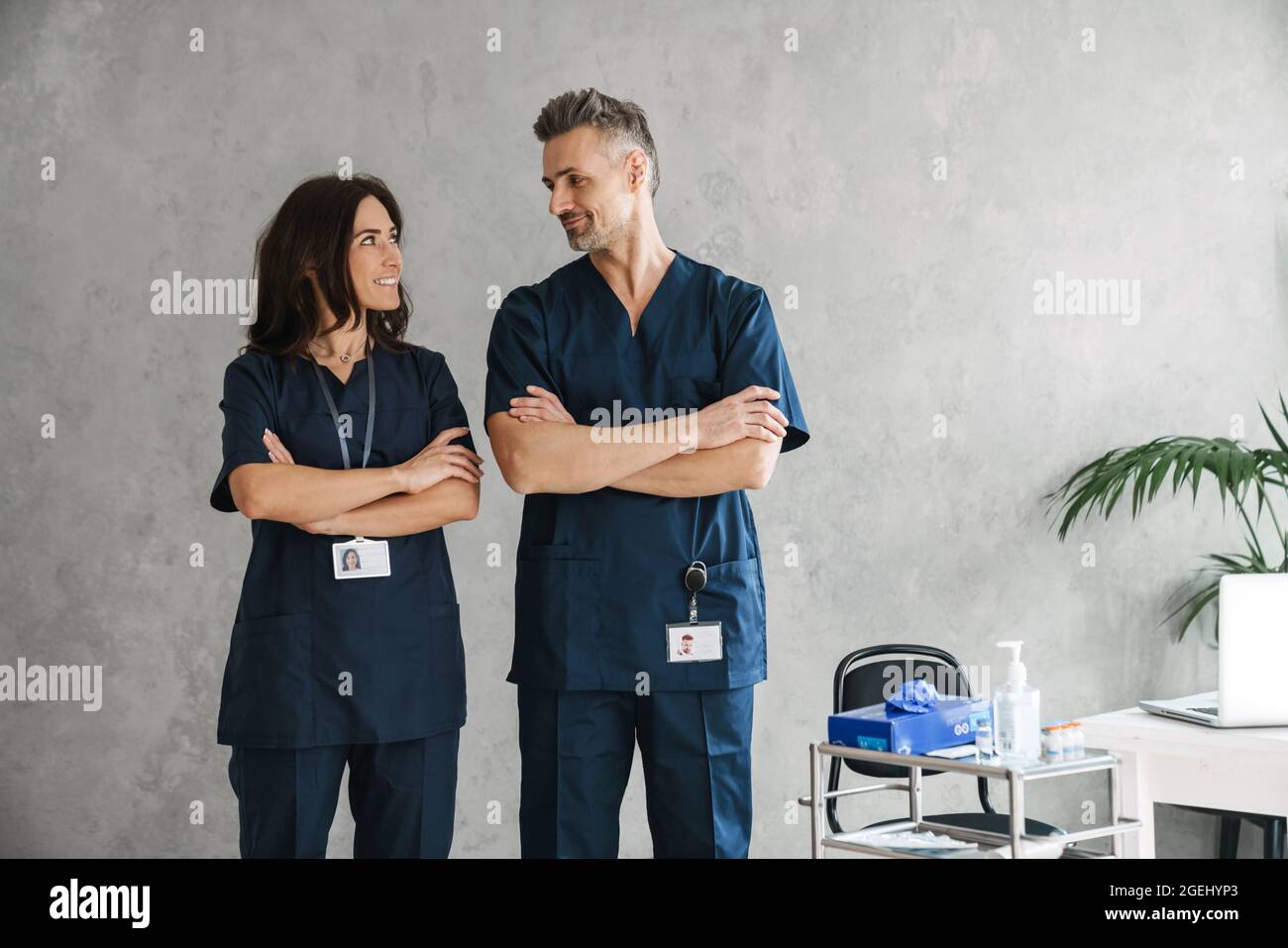 Two confident doctors stand in hi-res stock photography and images - Alamy