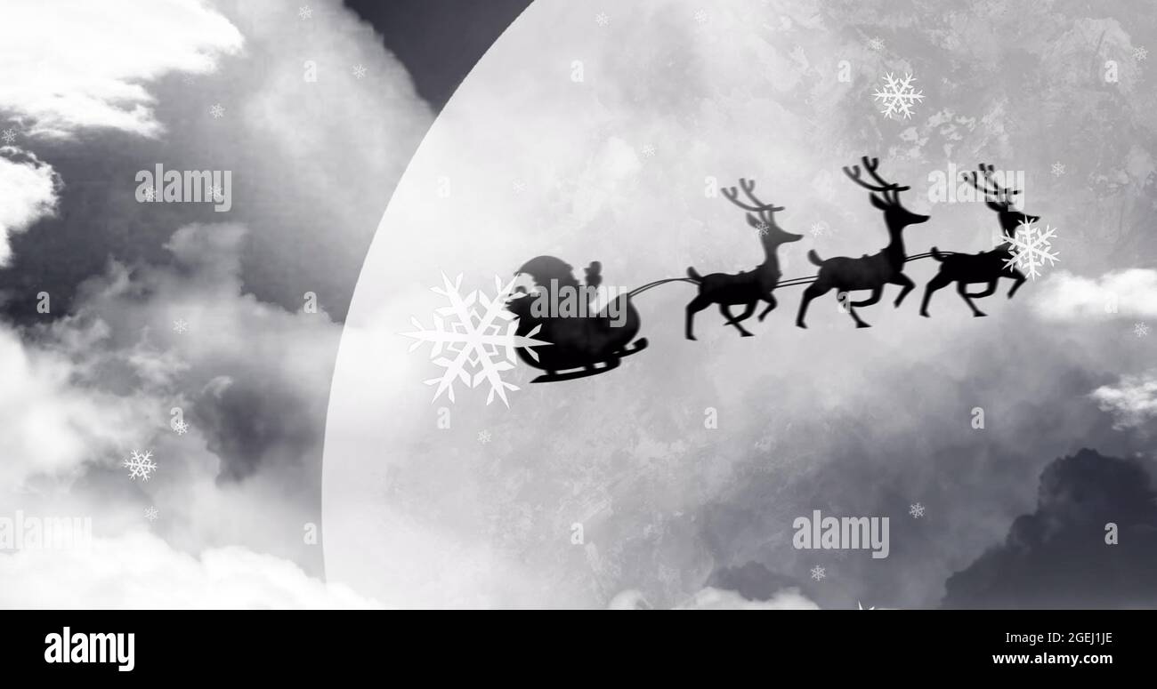Image of black silhouette on santa claus in sleigh being pulled by ...