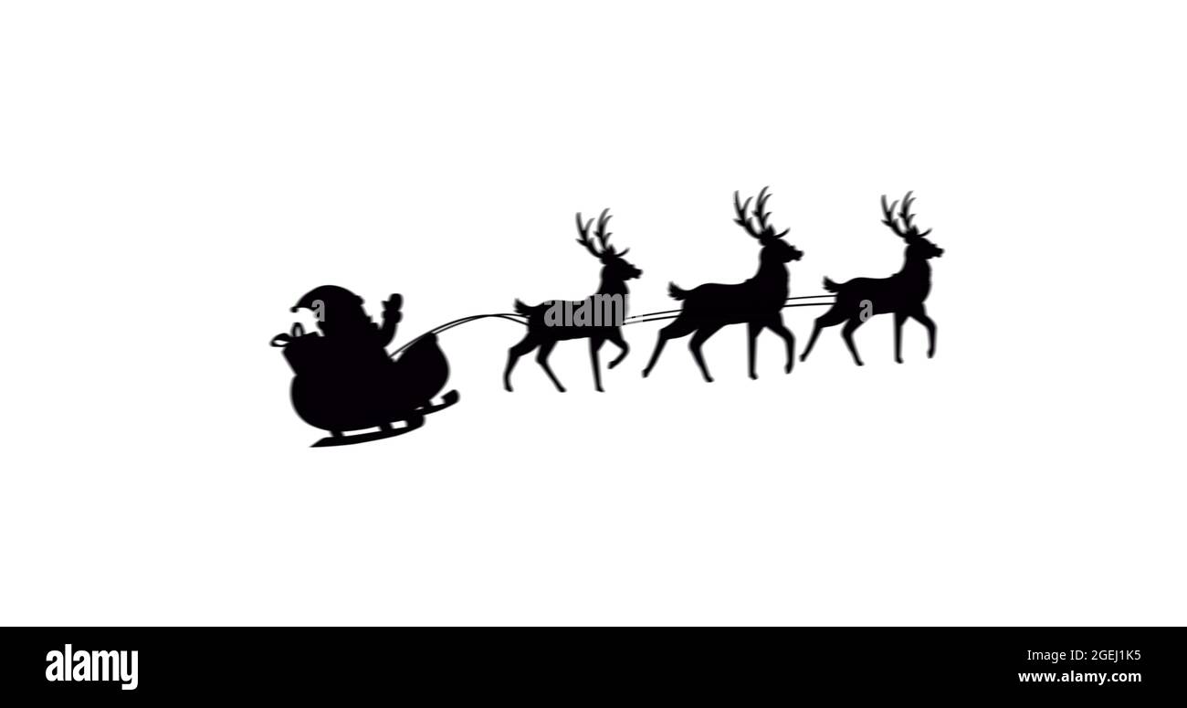 Image of black silhouette of santa claus in sleigh being pulled by ...