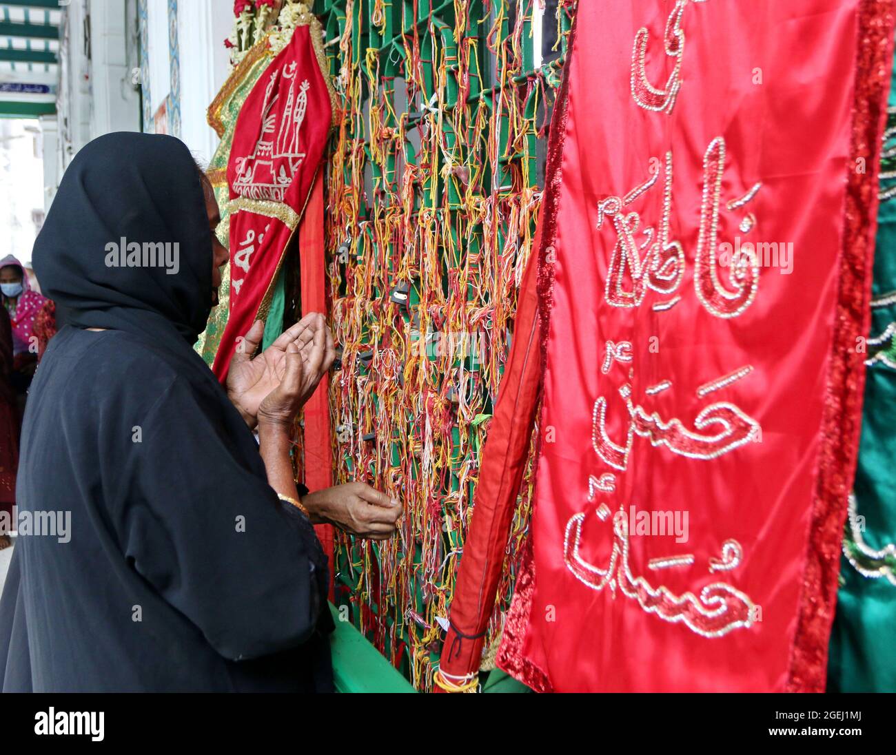Dhaka, Bangladesh, August 20: A shia woman prays  during  the day of mourning to commemorate Ashura Day. The tenth day of Muharram is celebrated as Ashura, Shia muslims celebrate the day as mourning day to recalling the martyrdom of Prophet Hazrat Muhammad's grandson Hazrat Imam Hussain, his relatives and 72 supporters during the clash of Karbala on this day in the Hijri year of 61. Credit: Habibur Rahman / Eyepix Group/Alamy Live News Stock Photo