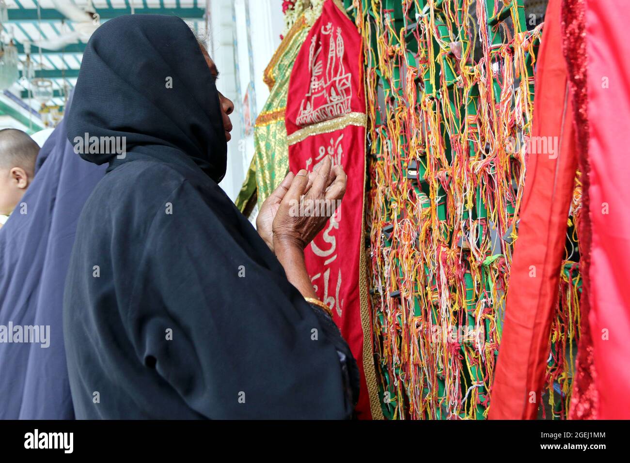 Dhaka, Bangladesh, August 20: A shia woman prays  during  the day of mourning to commemorate Ashura Day. The tenth day of Muharram is celebrated as Ashura, Shia muslims celebrate the day as mourning day to recalling the martyrdom of Prophet Hazrat Muhammad's grandson Hazrat Imam Hussain, his relatives and 72 supporters during the clash of Karbala on this day in the Hijri year of 61. Credit: Habibur Rahman / Eyepix Group/Alamy Live News Stock Photo