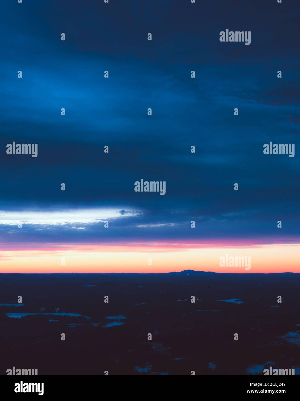 Watching the sunrise above Mount Wachusett from the White Cross Trail