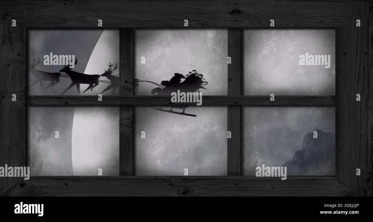 Image of black silhouette of santa claus in sleigh being pulled by ...