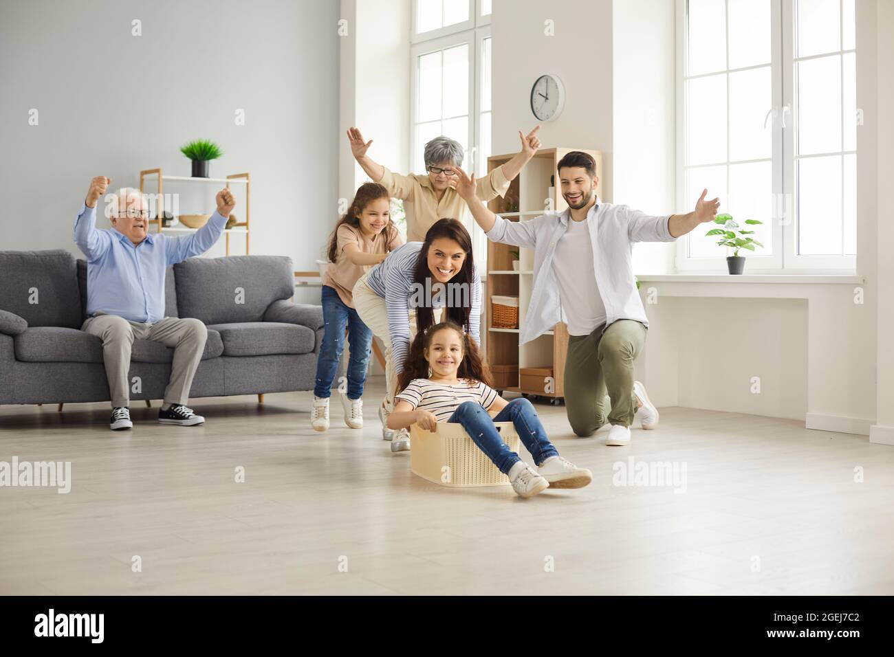 Happy big family with children have fun together at home playing and fooling around. Stock Photo