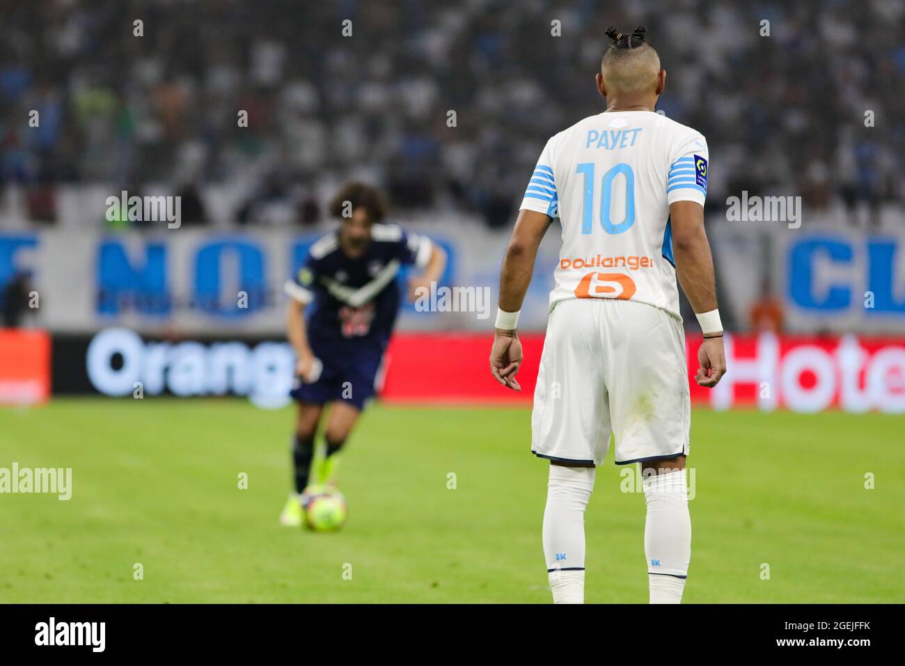 D. Payet #10 of Marseille in front of Y. Adli of Bordeaux who is going to take a free kick during the Ligue 1 match between Marseille and Bordeaux at Stock Photo