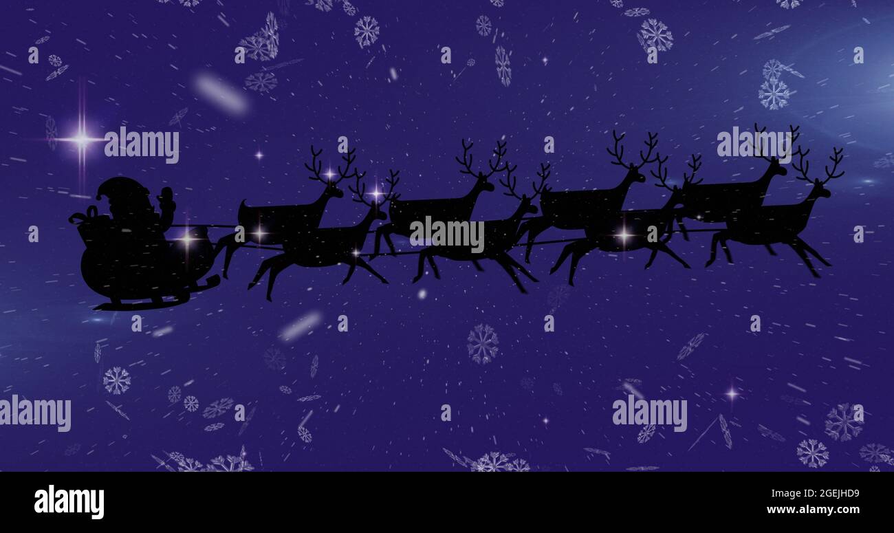 Image of black silhouette of santa claus in sleigh being pulled by ...